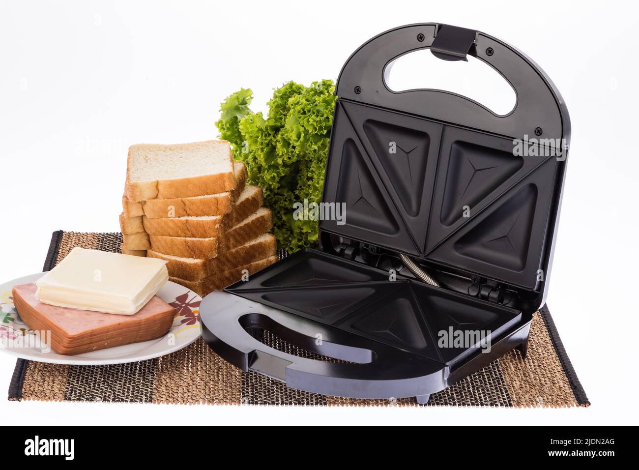 black sandwich maker on white background Stock Photo - Alamy