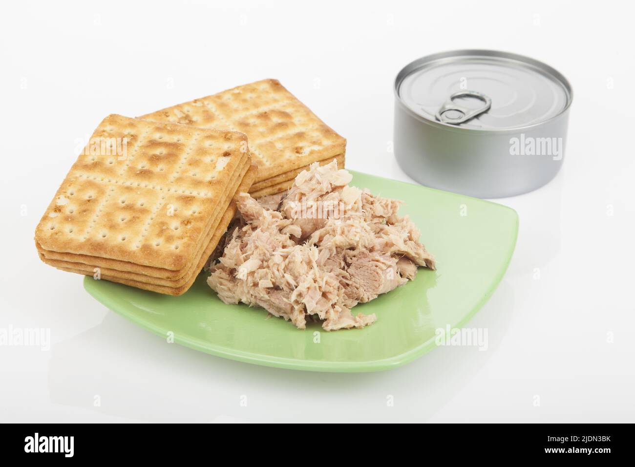 Cookies of salt with canned tuna; photo on white background Stock Photo