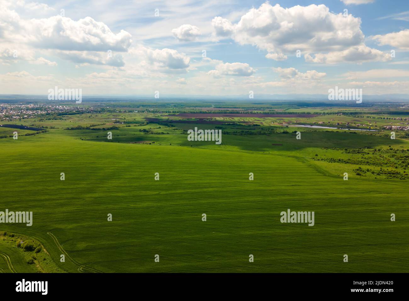 Aerial landscape view of green cultivated agricultural fields with ...