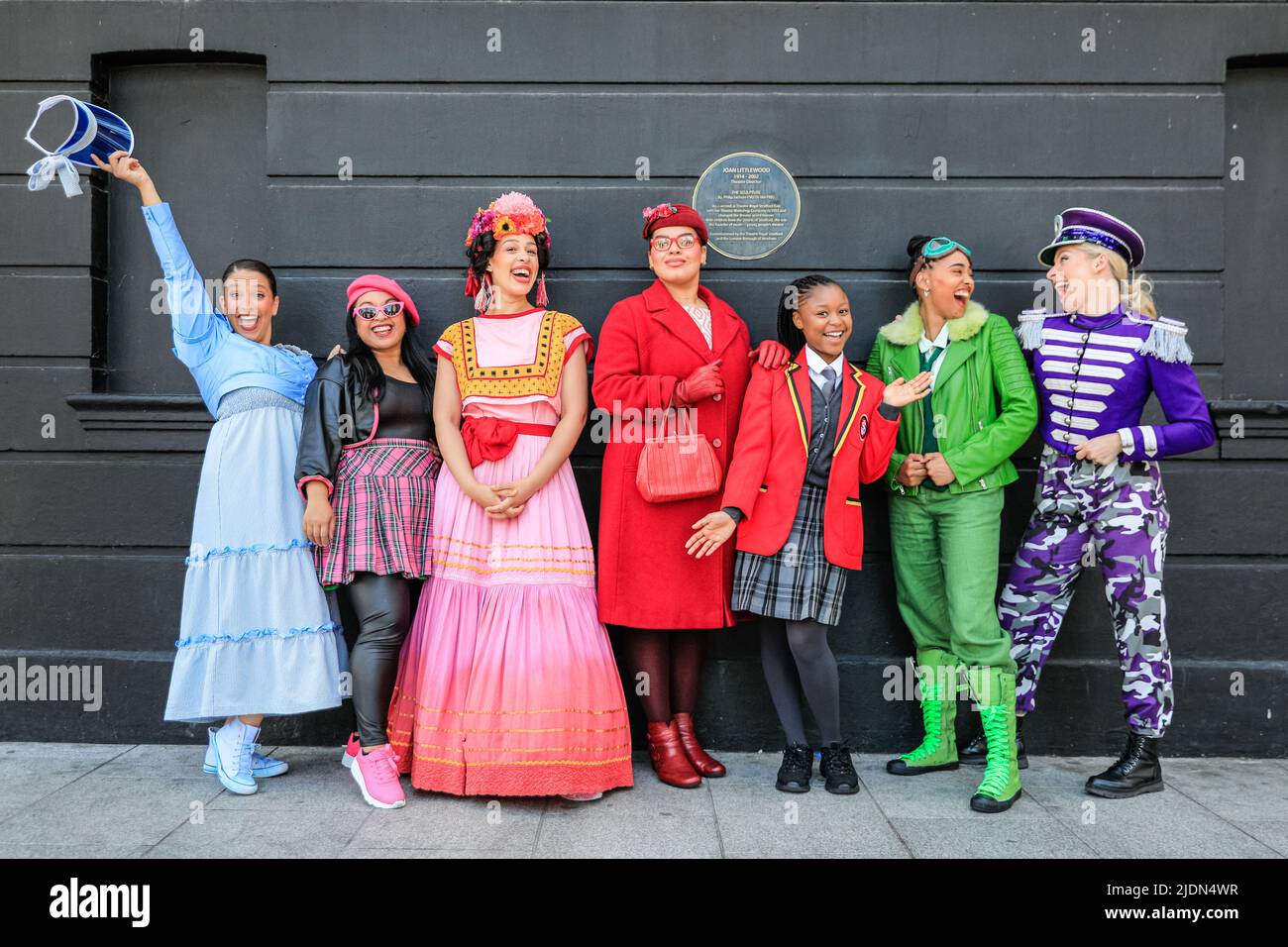 London, UK, 22nd June, 2022. The cast of 'Fantastically Great Women Who Changed the World' pose by the statue of theatre trailblazer Joan Littlewood. The empowering pop musical is at Theatre Royal Stratford East until 17 July. Credit: Imageplotter/Alamy Live News Stock Photo
