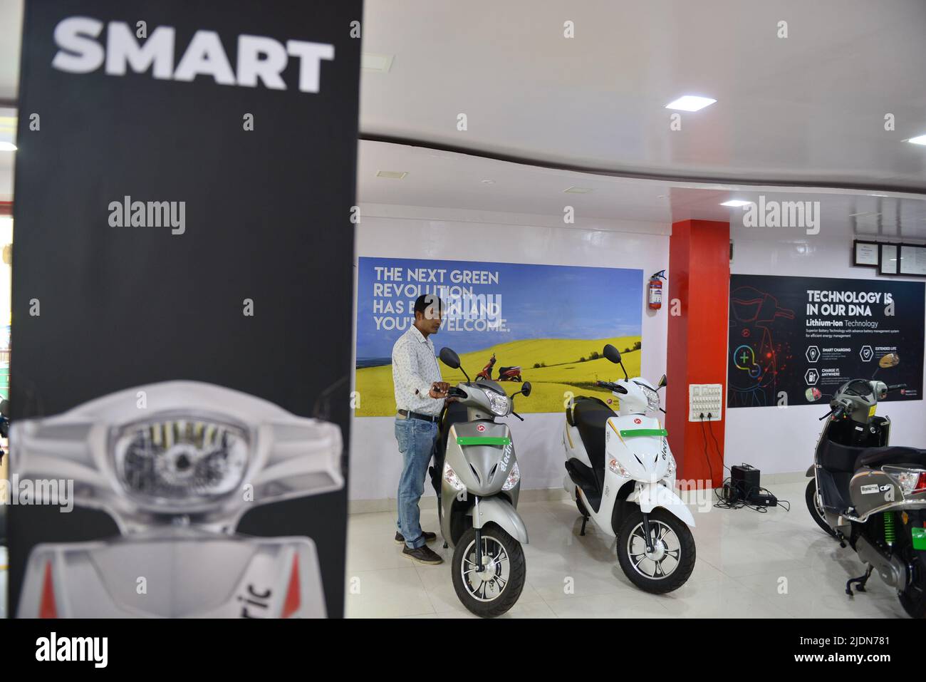 Salesperson seen at the Hero Electric Showroom. Hero Electric is one of