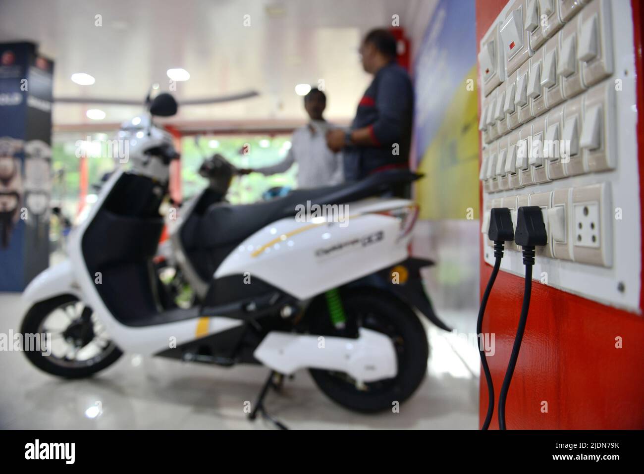 An electric twowheeler vehicle seen charging at the Hero Electric