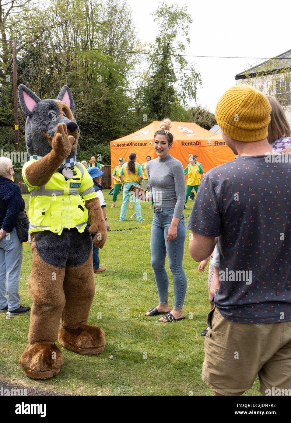 NORTHAM, DEVON, ENGLAND - APRIL 30 2022: Police community liaison at village May Day celebrations. Mascot Bravo the Police Dog. Stock Photo