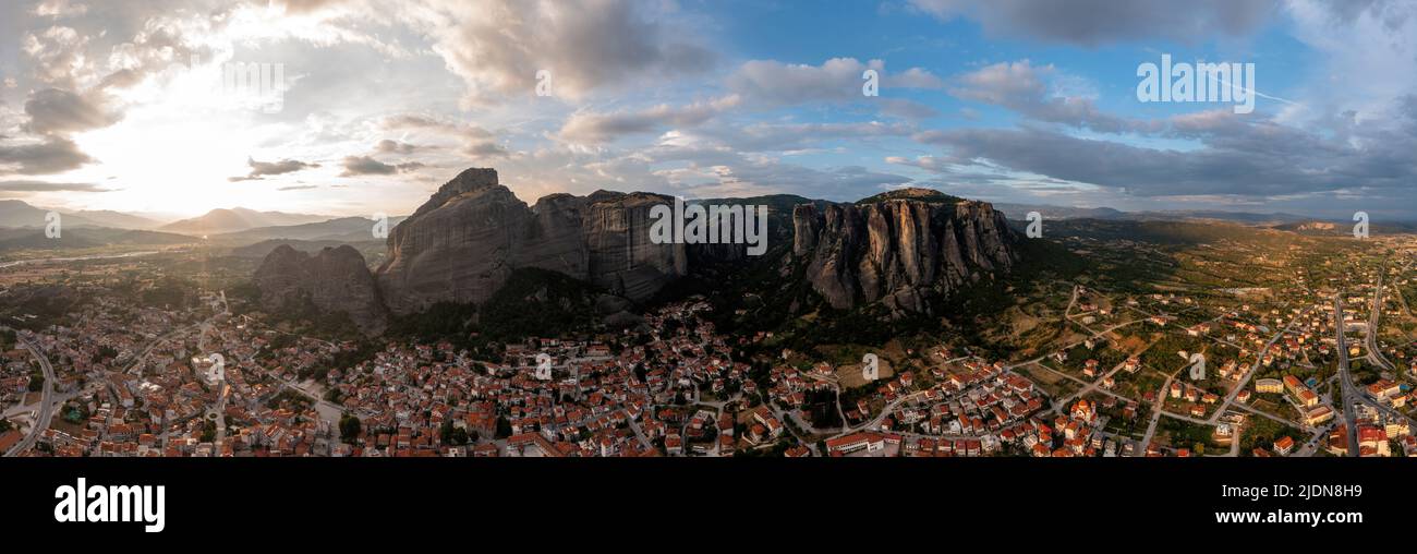Meteora Greece panorama. Sunset and cloudy sky over Kalabaka town. Rock formations landscape, Europe travel destination Stock Photo