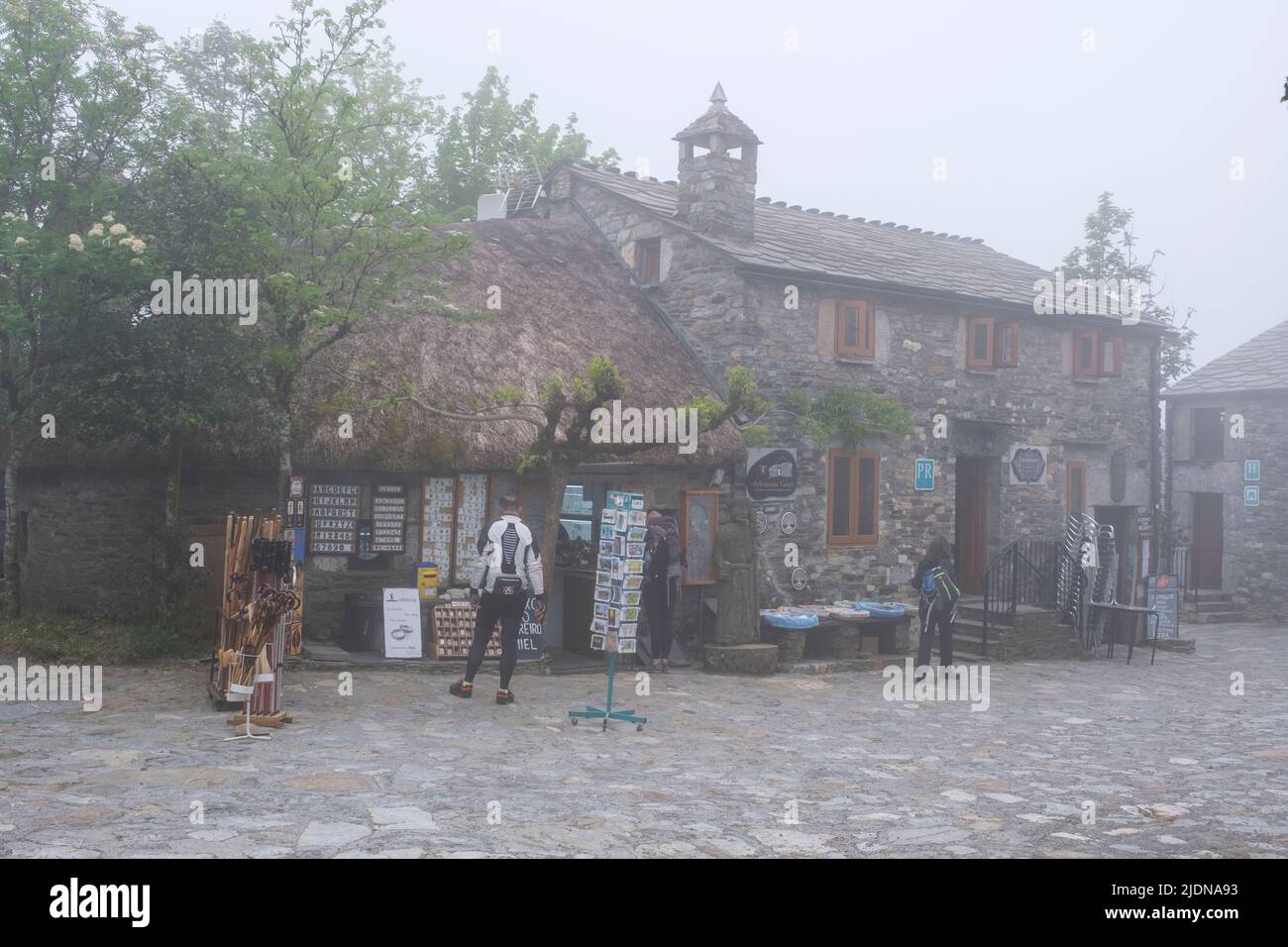 Spain, Galicia, O Cebreiro. Souvenir Shop on a Foggy Morning. Stock Photo