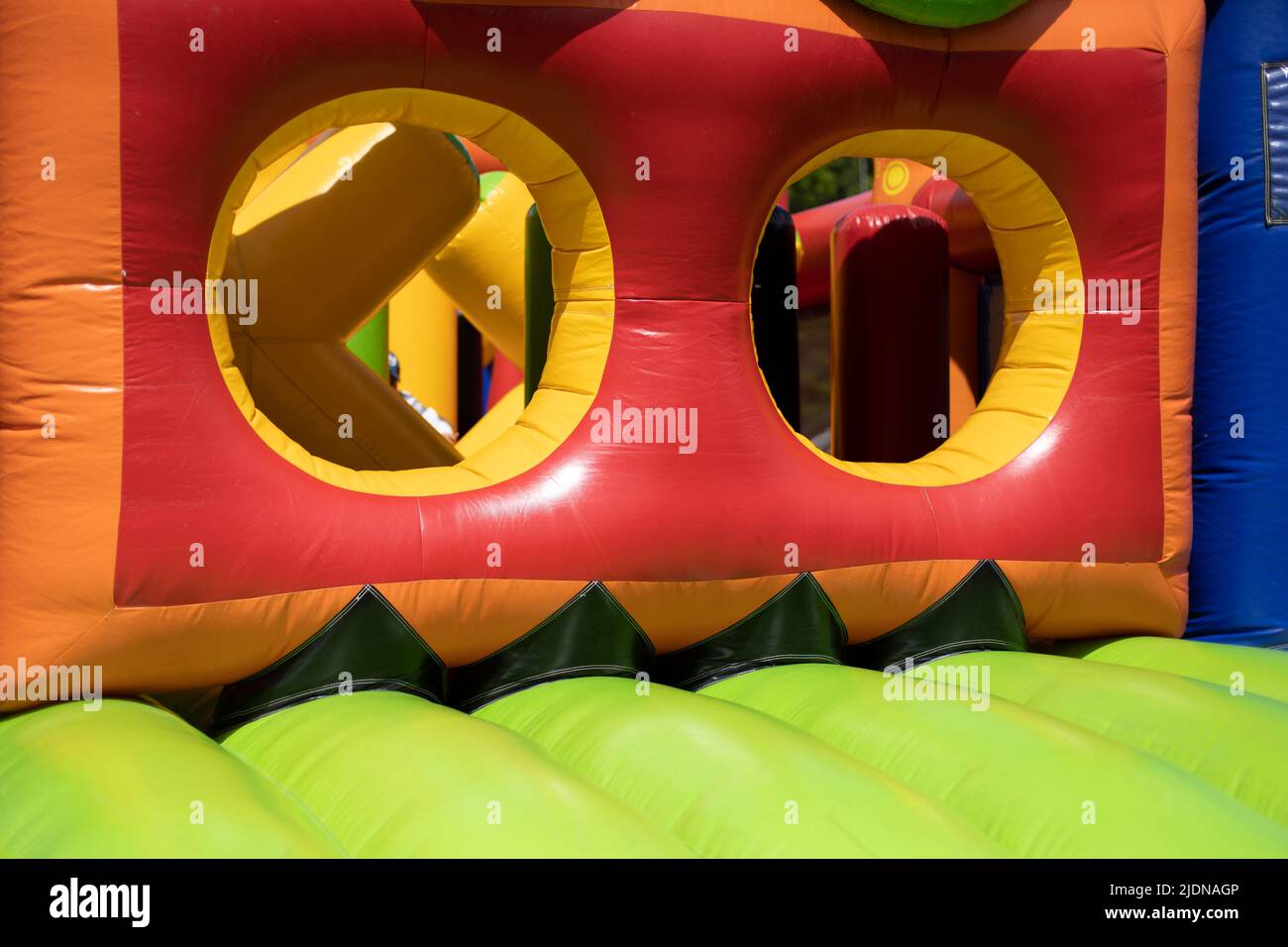 Inflated obstacle course. Rubber trampoline. Entertainment area in