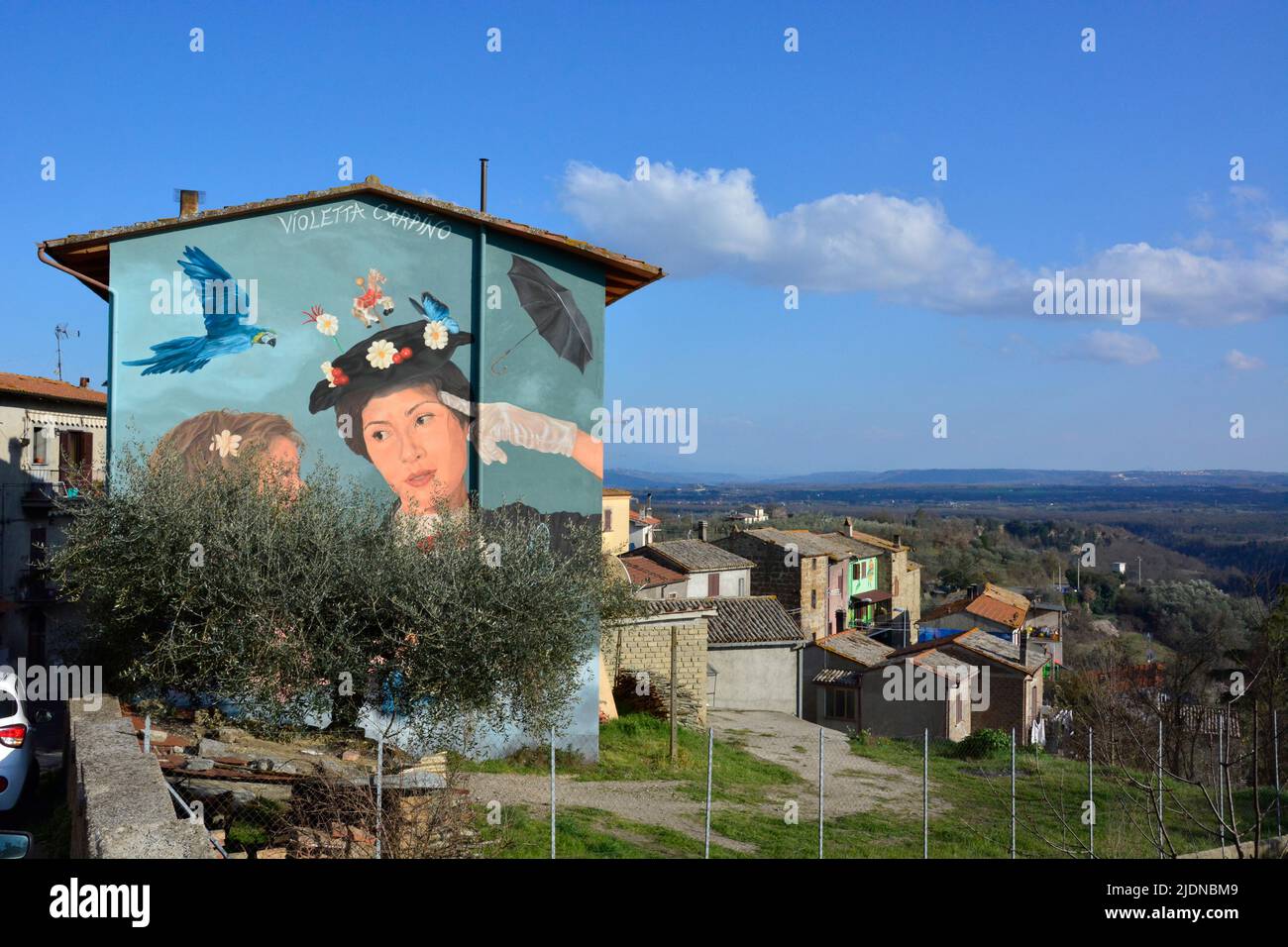 Small village in the center of Italy renewed with building facades painted with most famouse fairy tales Stock Photo