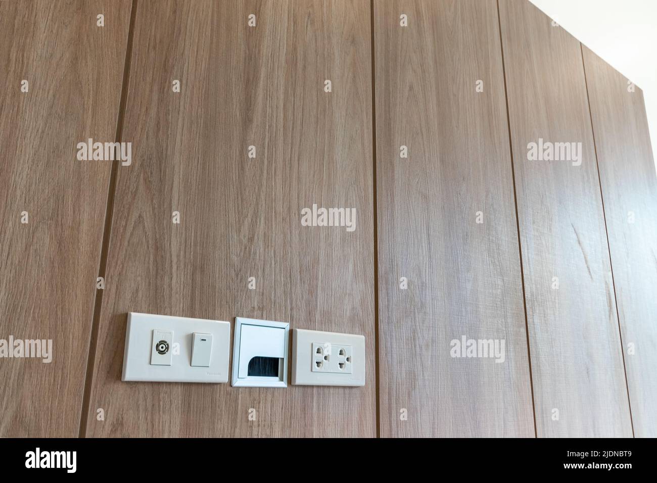 Power outlet on wooden Wall Background Stock Photo Alamy