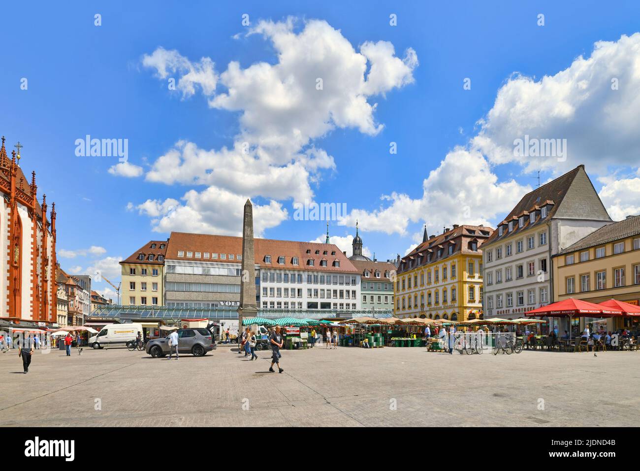 Würzburg, Germany - June 2022: Market town square called 'Unterer Markt' with daily market and people on sunny day Stock Photo