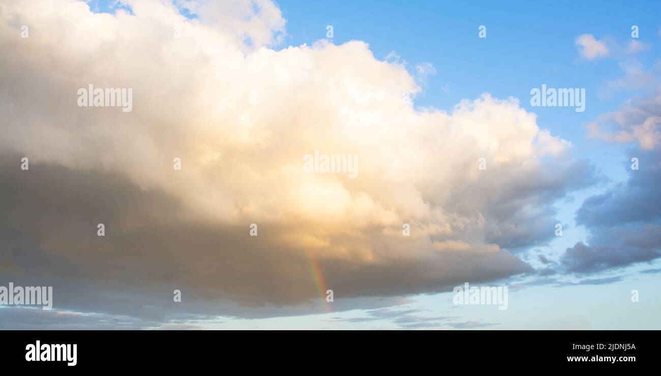 Cumulus cloud rainbow hi-res stock photography and images - Alamy
