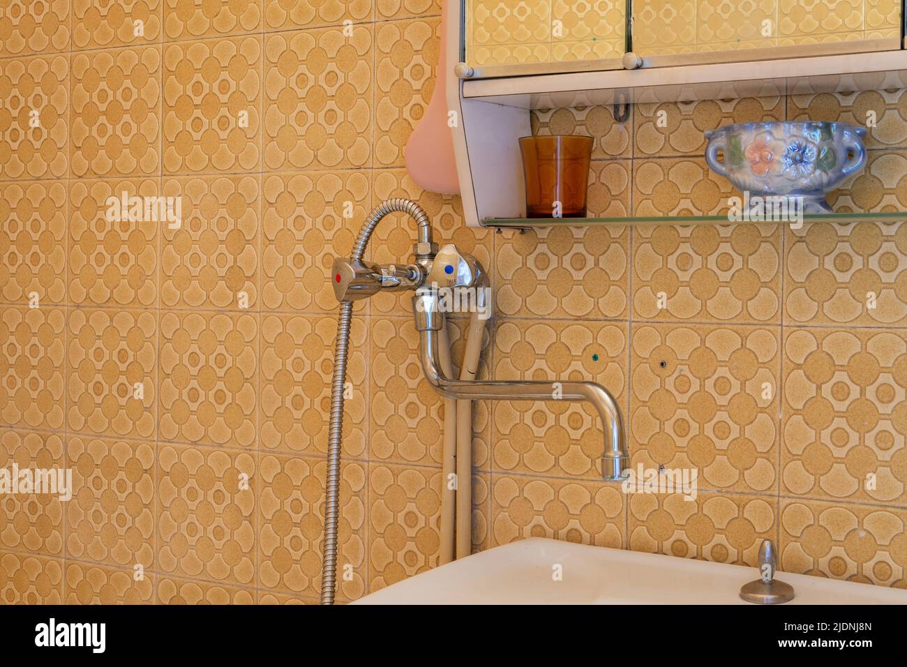 Old bathroom faucet, with crosspieces and long spout Stock Photo Alamy