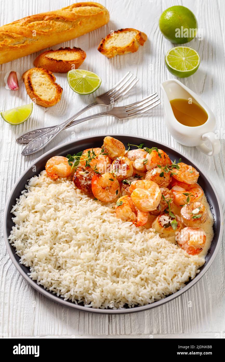 shrimps and scallops in spicy coconut cream sauce with long grain rice