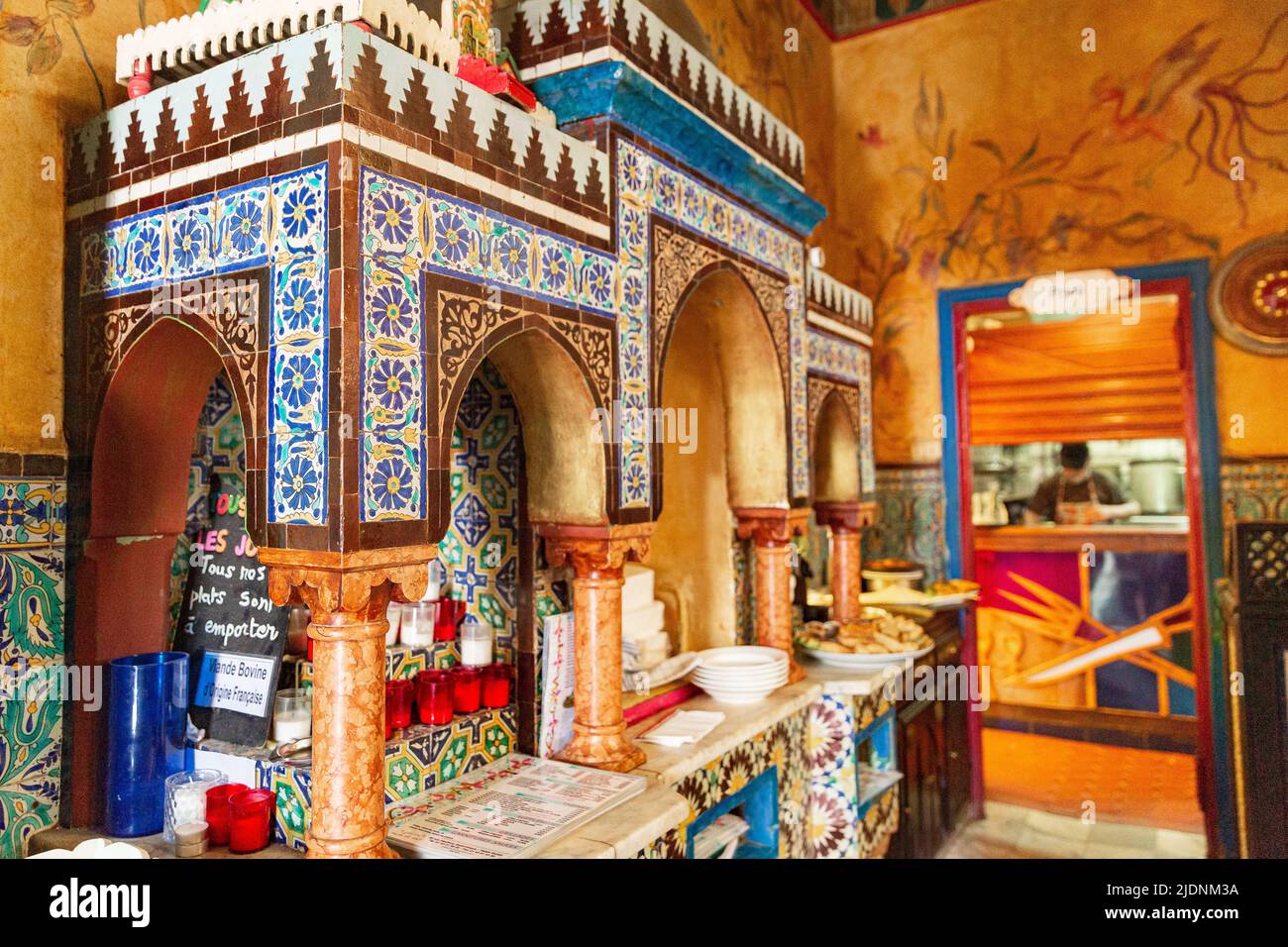 Paris, France - June 07, 2018: Eastern side of the Great Mosque of Paris with the entrance of the tea room and restaurant, the dome of the prayer hall Stock Photo