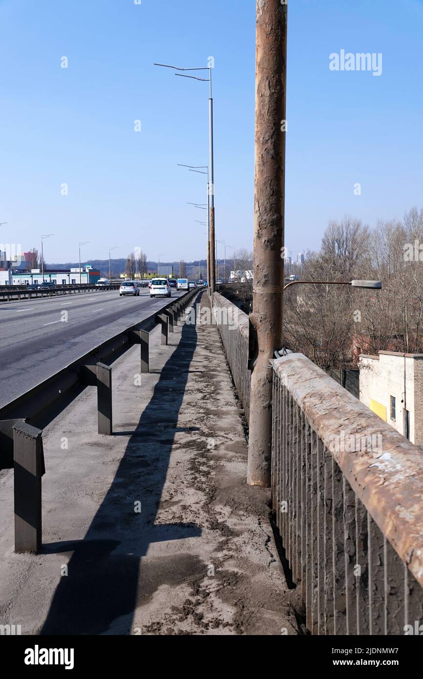 Kiev, Ukraine March 18, 2020: South bridge over the Dnieper River, aging, rusting and requiring repair Stock Photo