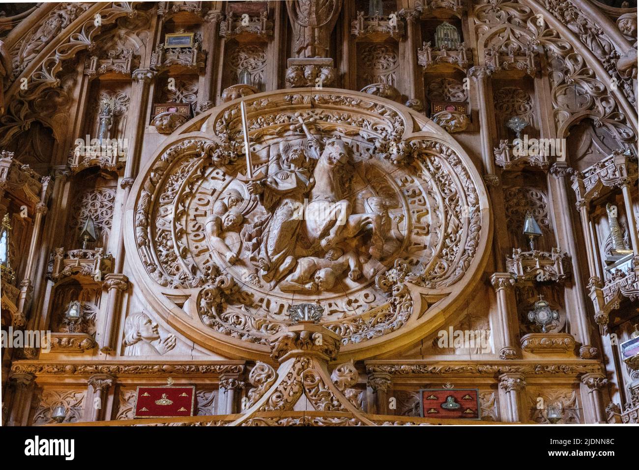 Spain, Santiago de Compostela, Galicia. Neo-Gothic Altarpiece in the Chapel of the Relics (Capilla de las Reliquias) Dating from 1925 Showing Santiago Stock Photo