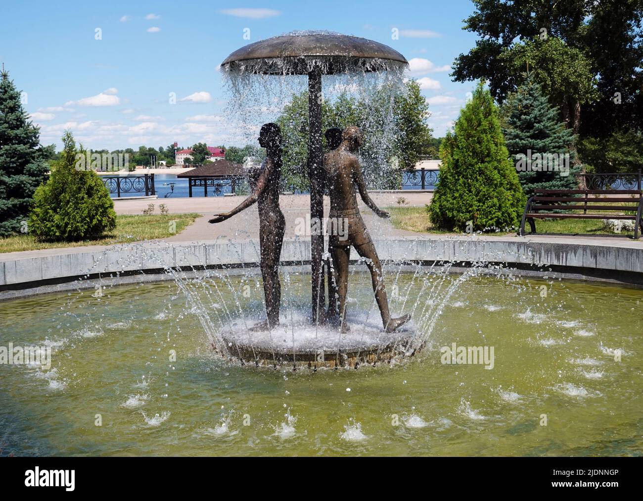 Kiev, Ukraine July 20, 2020: Sculpture - fountain of a girl under an umbrella in the park Stock Photo