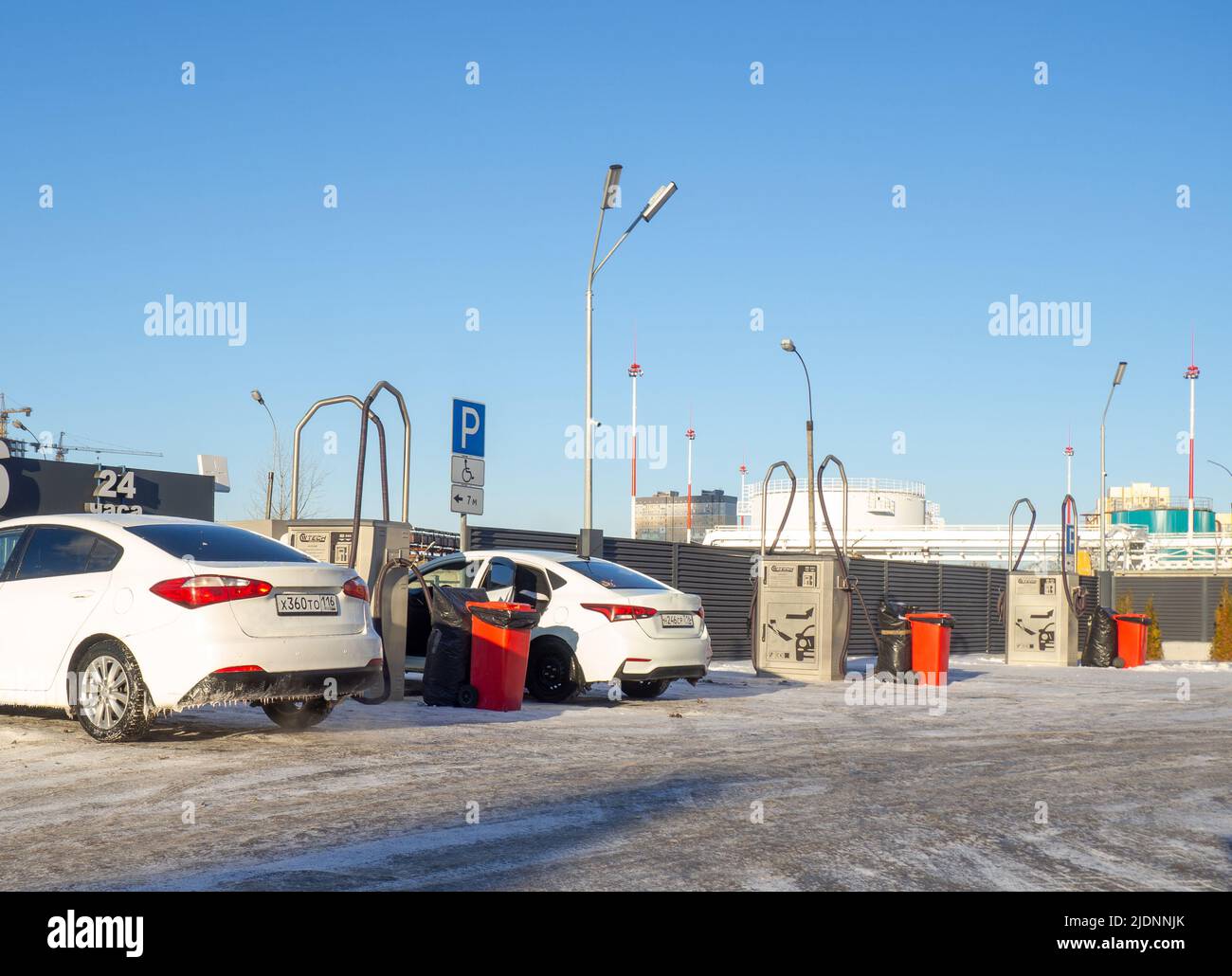 Car at the gas station. Refueling. Car enthusiasts. Life in the city Stock Photo