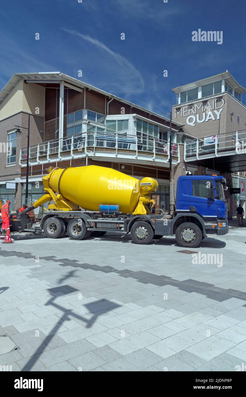 Yellow ready mix concrete lorry working at Cardiff Bay, summer 2022