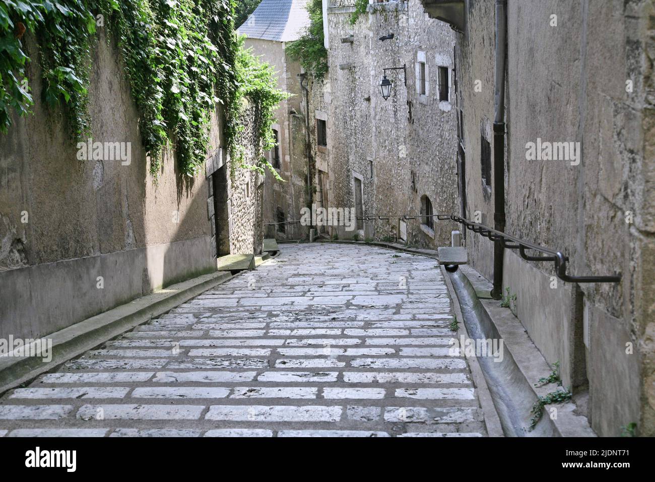 Narrow cobblestone street in the medieval city of Blois, France Stock Photo