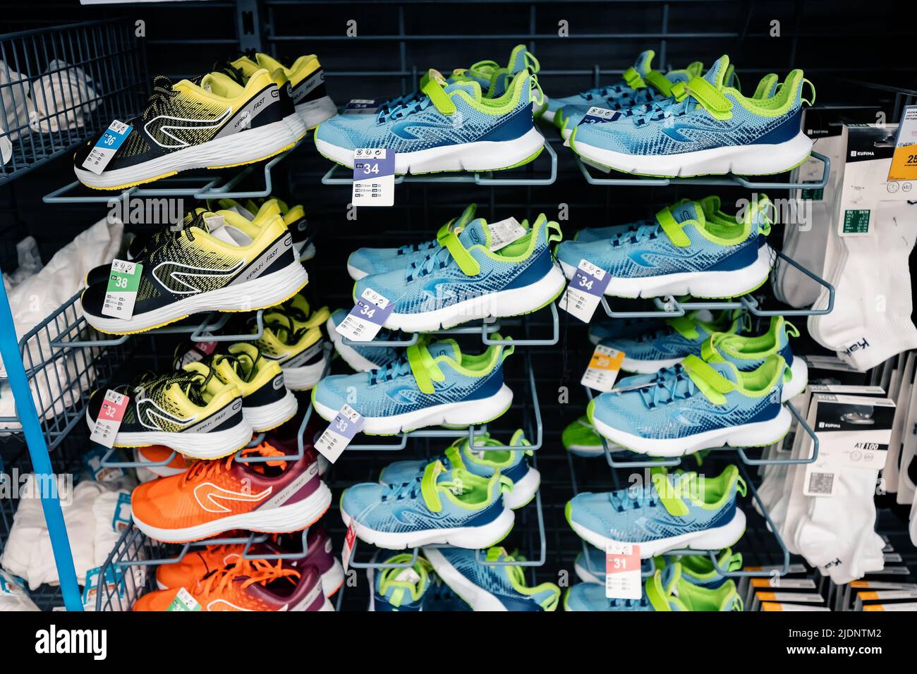 Kalenji branded running shoes in Decathlon store. Kalenji is Decathlon`s  own running (shoes and clothing) brand Stock Photo - Alamy