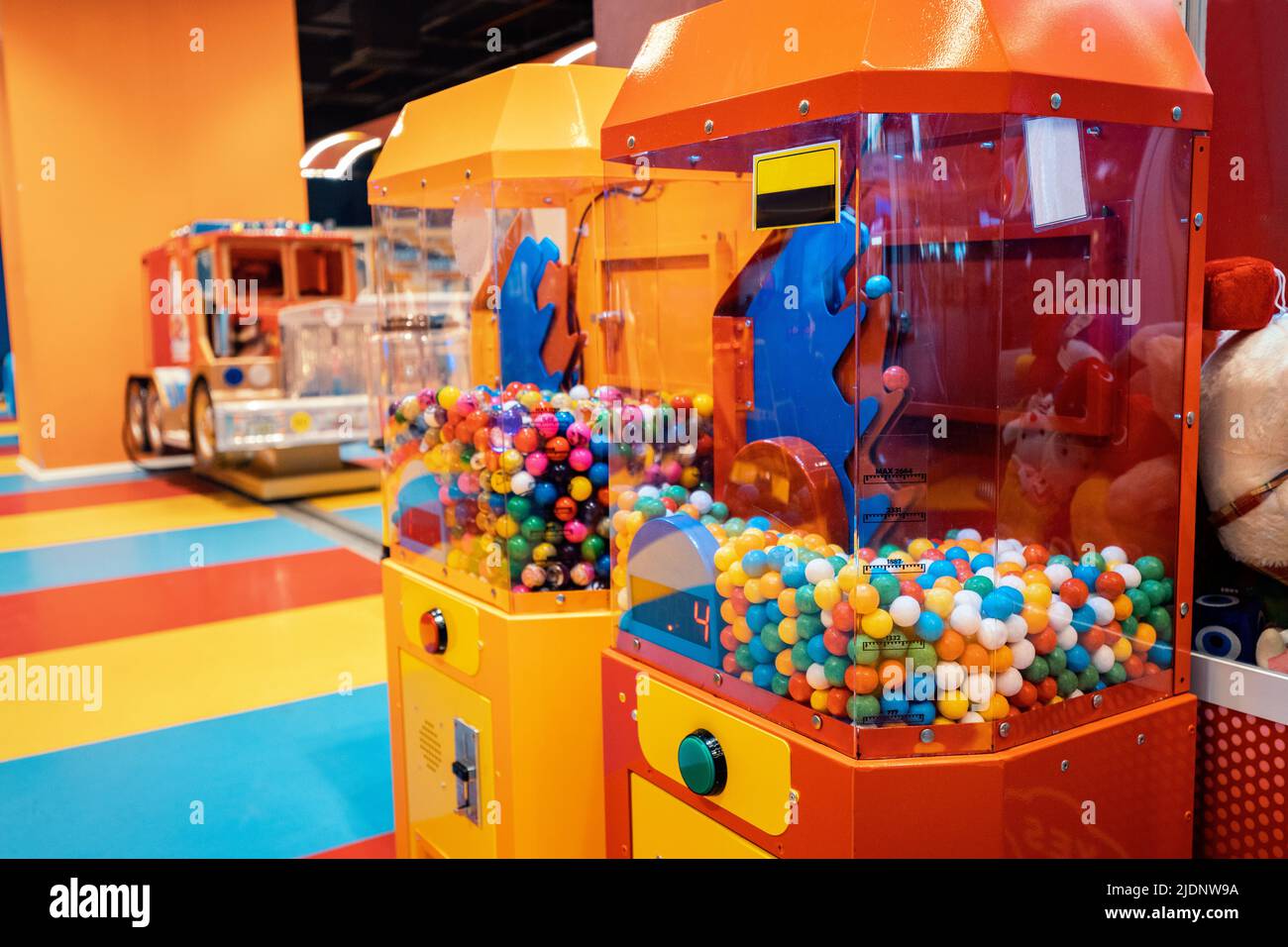 Chewing bubble gum dispenser machine for kids in amusement park Stock
