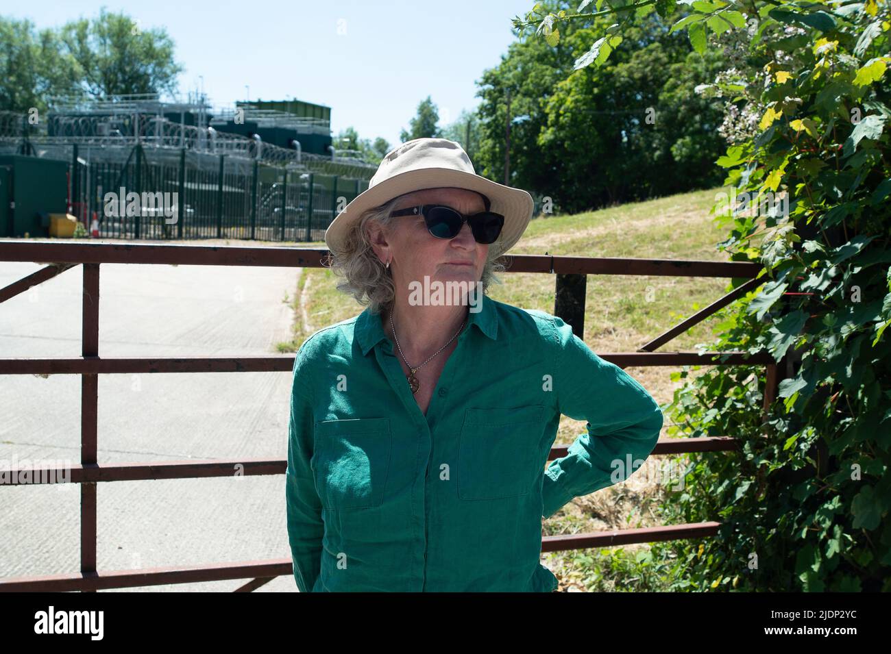 West Hyde, Hertfordshire, UK. 22nd June, 2022. Hillingdon Green party Co-Ordinator, Sarah Green took Baroness Jenny Jones of Moulsecoomb (pictured) to the HS2 South Portal compound today. HS2 are allegedly discharging waste water to the environment there that is 118% above background levels of Ammoniacal Nitrogen and 113% above background levels of pH meaning additional purification works are having to take place at Northmoor and West Hyde pumping stations. Credit: Maureen McLean/Alamy Live News Stock Photo