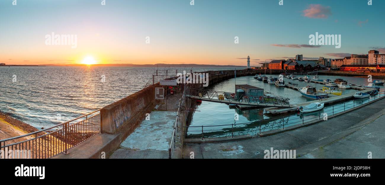 Newhaven Harbour at Sunset, which is used for mooring private boats Edinburgh, Scotland, UK Stock Photo