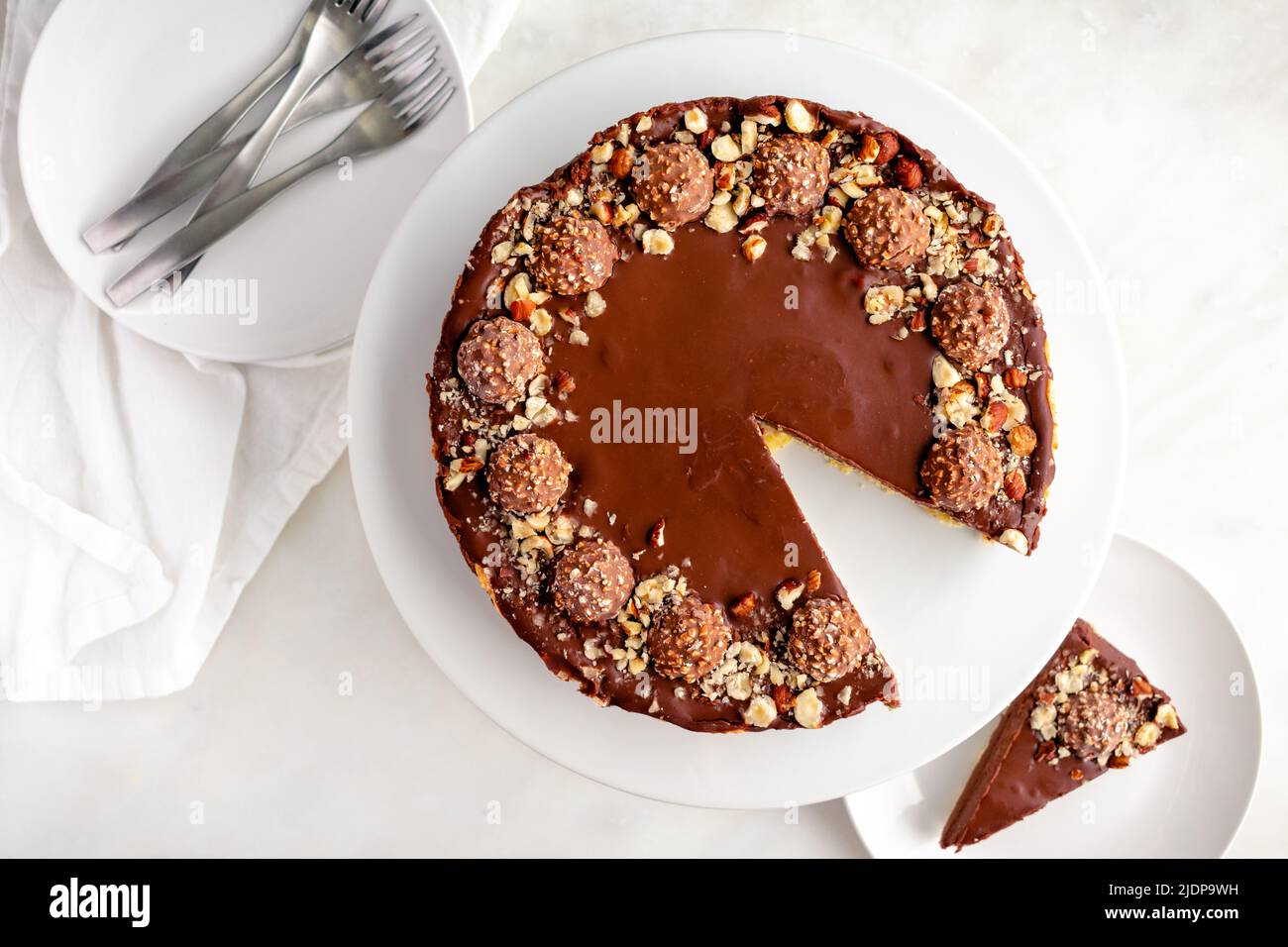 Chocolate Hazelnut Tart Garnished with Chocolates and Nuts Chocolate