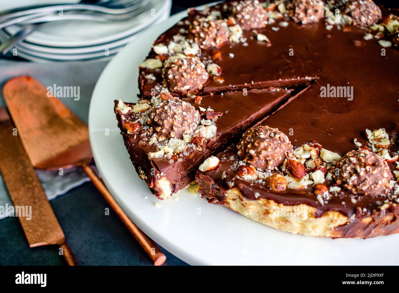 Closeup View of Sliced Chocolate Hazelnut Tart Chocolate ganache tart