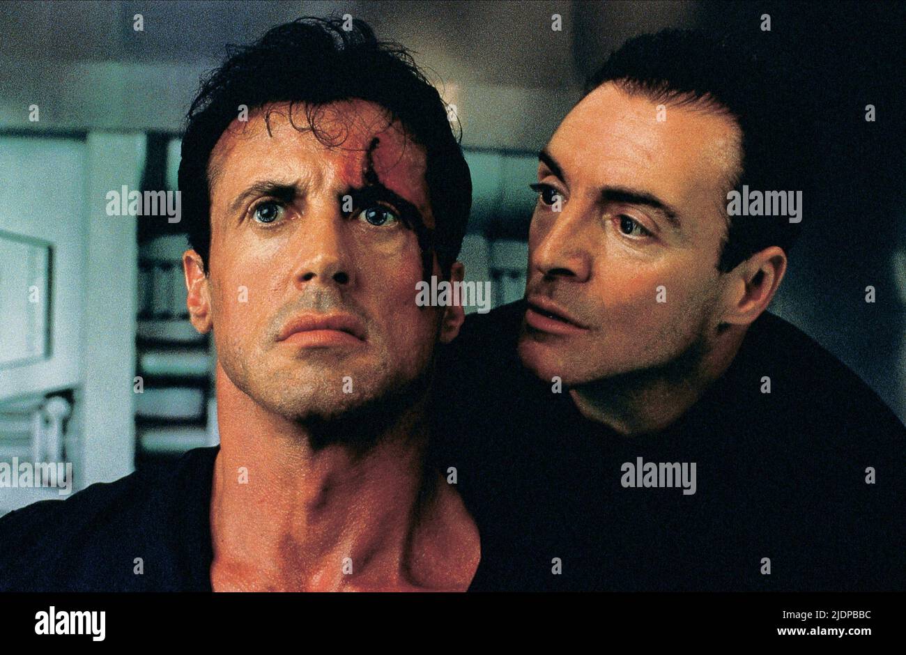 Sylvester Stallone & Armand Assante Film: Judge Dredd (USA 1995) Characters: Judge Dredd & Rico  Director: Danny Cannon 30 June 1995   **WARNING** This Photograph is for editorial use only and is the copyright of BUENA VISTA and/or the Photographer assigned by the Film or Production Company and can only be reproduced by publications in conjunction with the promotion of the above Film. A Mandatory Credit To BUENA VISTA is required. The Photographer should also be credited when known. No commercial use can be granted without written authority from the Film Company. Stock Photo