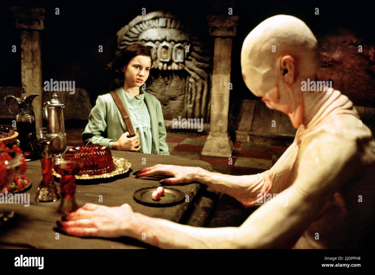 Ivana Baquero, Doug Jones as the Pale Man, "Pan's Labyrinth" (2006) Credit:  Warner Bros. / The Hollywood Archive Stock Photo - Alamy