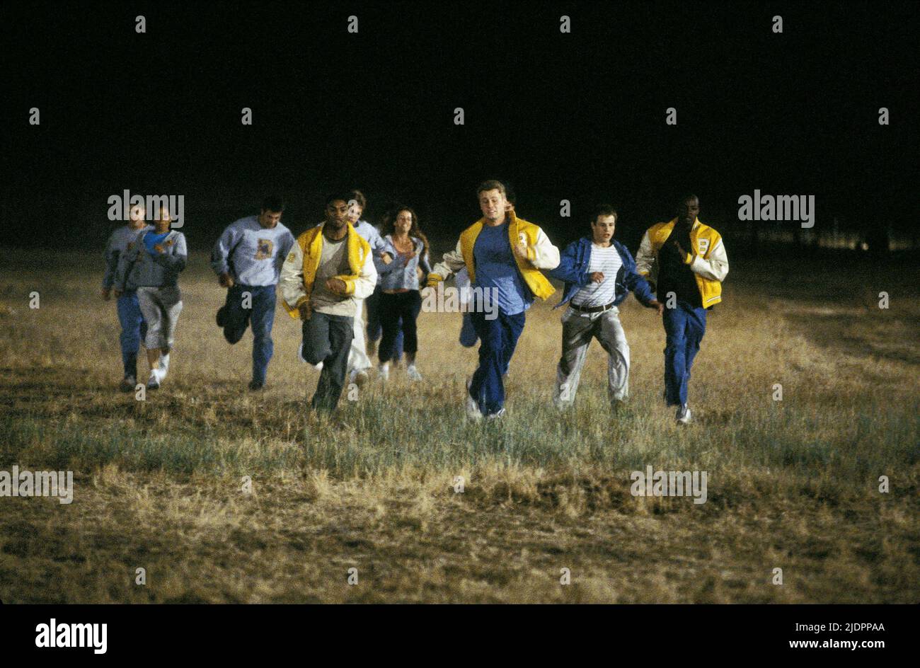 STUDENTS RUN THROUGH FIELD, JEEPERS CREEPERS II, 2003, Stock Photo
