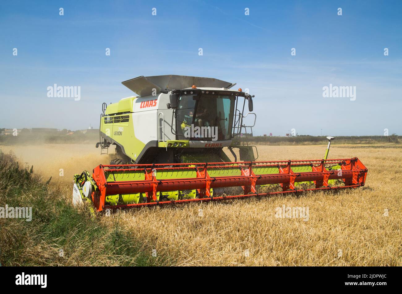 Combine harvester working in Lincolnshire, UK, in summer 2021. Stock Photo