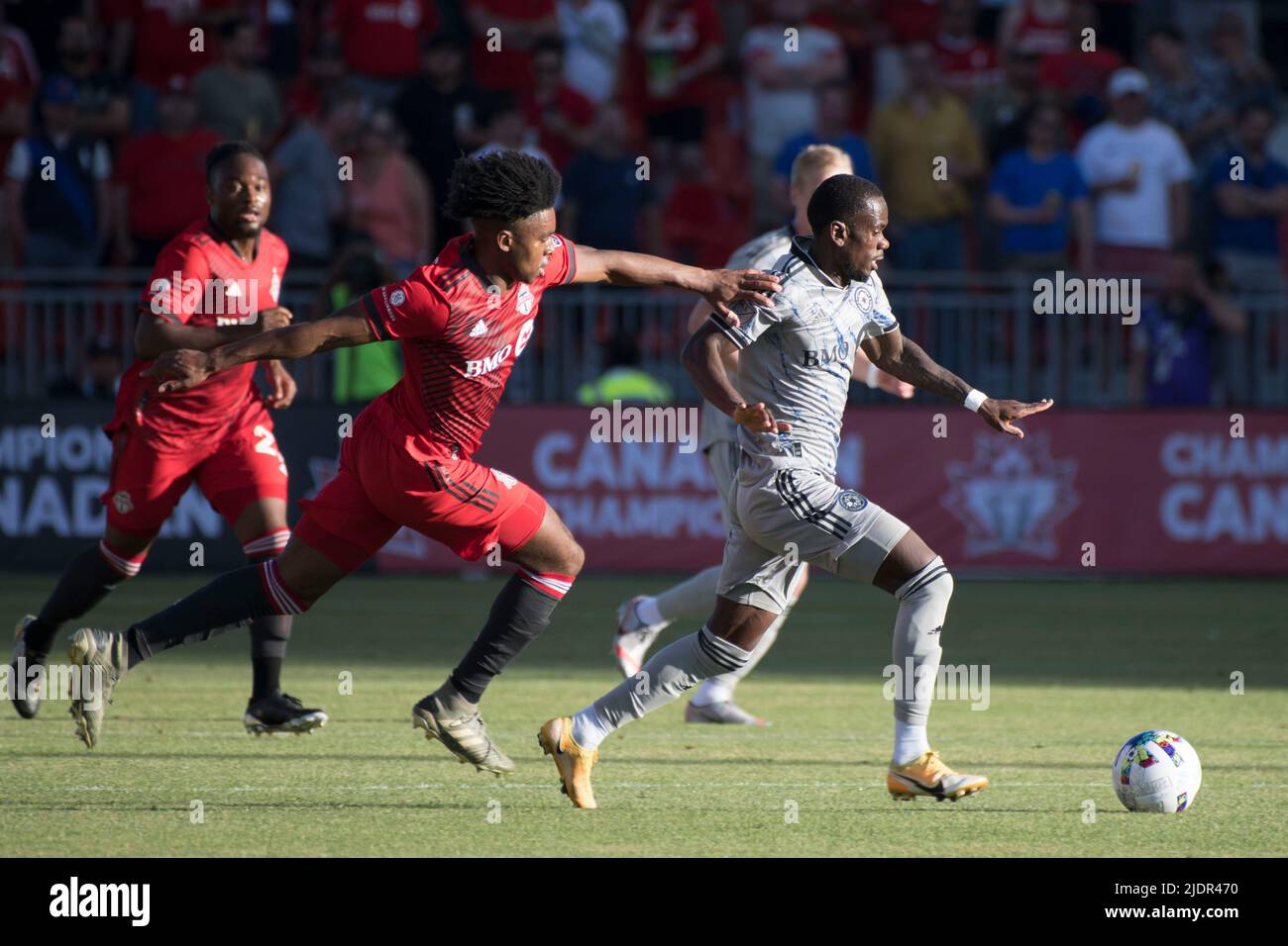 Toronto, Ontario, Canada. 22nd June, 2022. Ralph Priso-Mbongue (8) and Jojea Kwizera (17) in action during the Canadian Championship game between Toronto FC and CF Montreal. The game ended 4-0 for Toronto FC. (Credit Image: © Angel Marchini/ZUMA Press Wire) Stock Photo