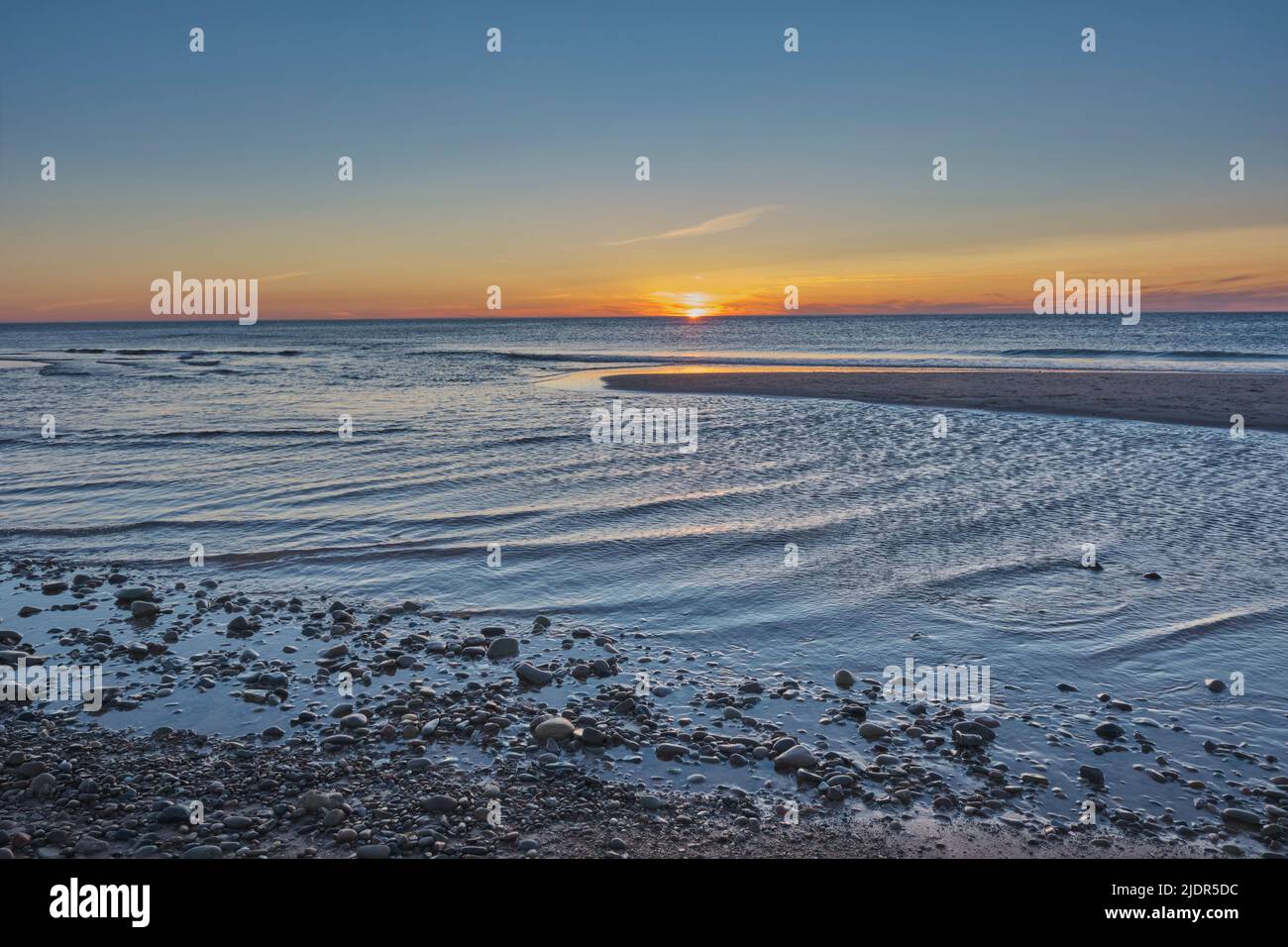 The beautiful beach in Inverness Cape Breton Nova Scotia photographed at sunset. Stock Photo