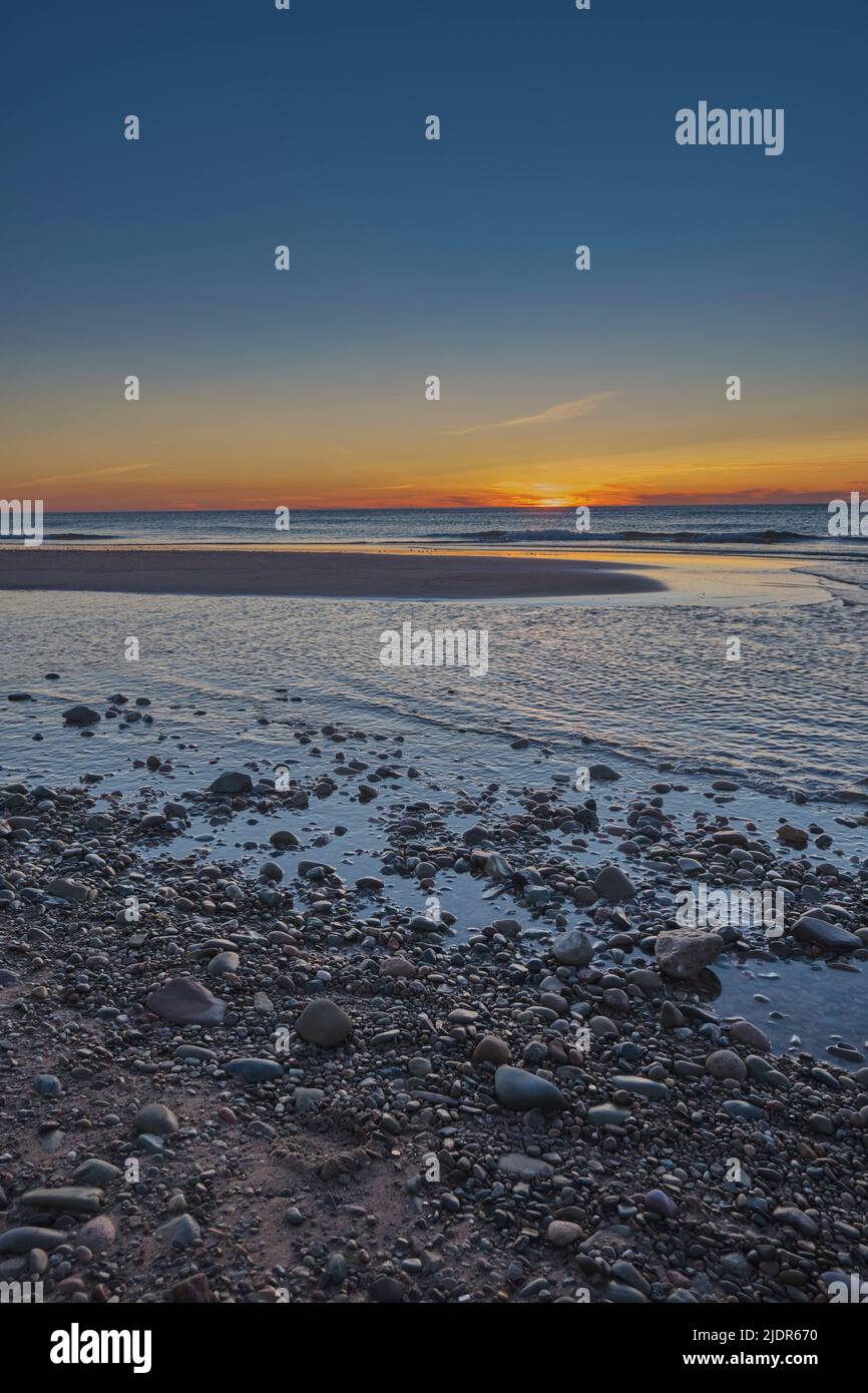The beautiful beach in Inverness Cape Breton Nova Scotia photographed at sunset. Stock Photo