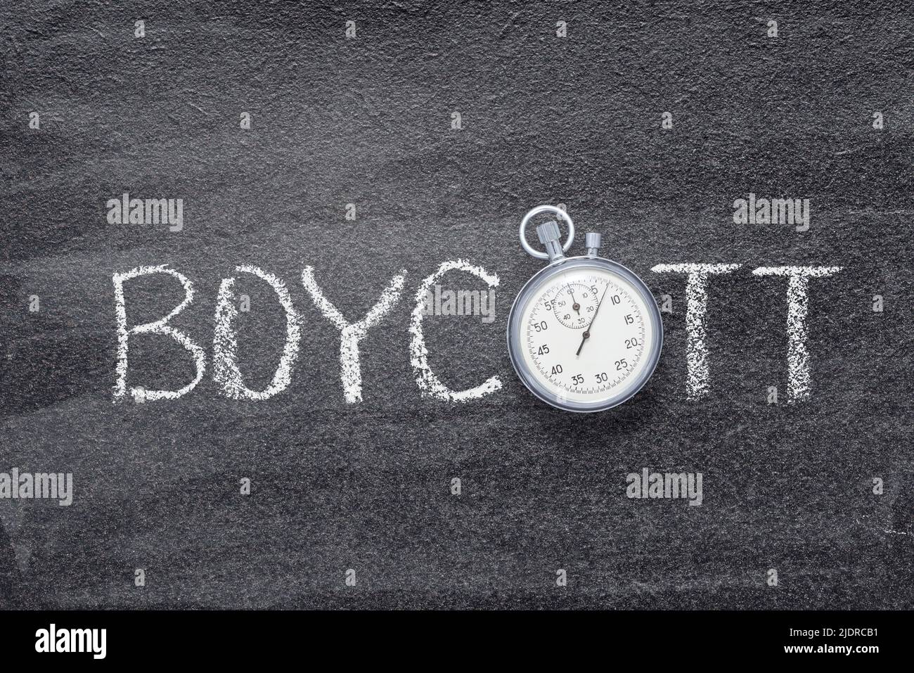 boycott word written on chalkboard with vintage precise stopwatch Stock Photo