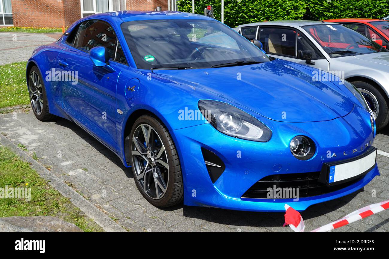 Papenburg, Germany - June 17 2022 Renault Alpine club meeting day. On the corner stands a blue Alpine A110 (version 2017) Stock Photo