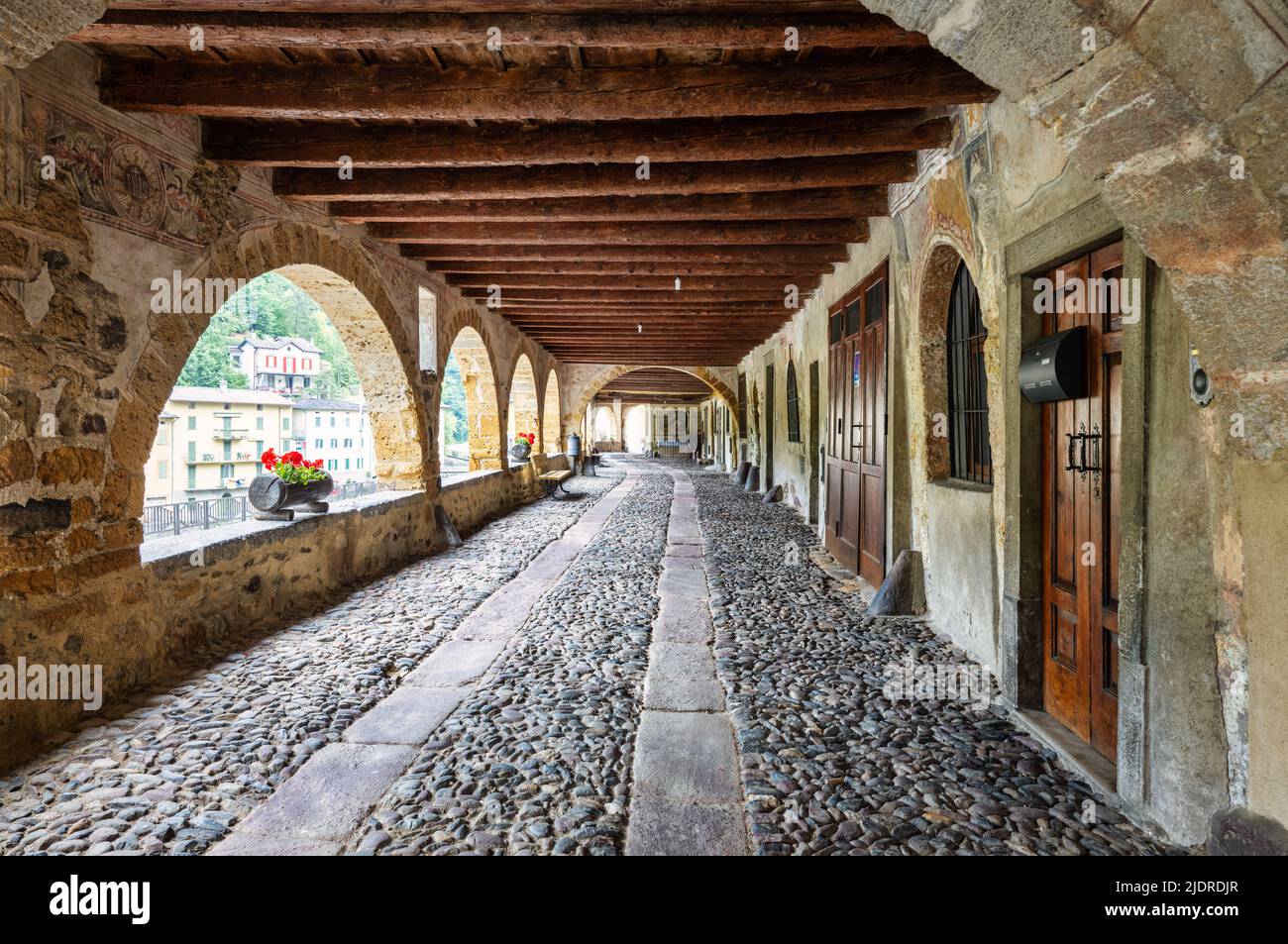 The historic old porticoed street of Averara. Brembana Valley Bergamo Italy. Brembana Valley Bergamo Italy Stock Photo