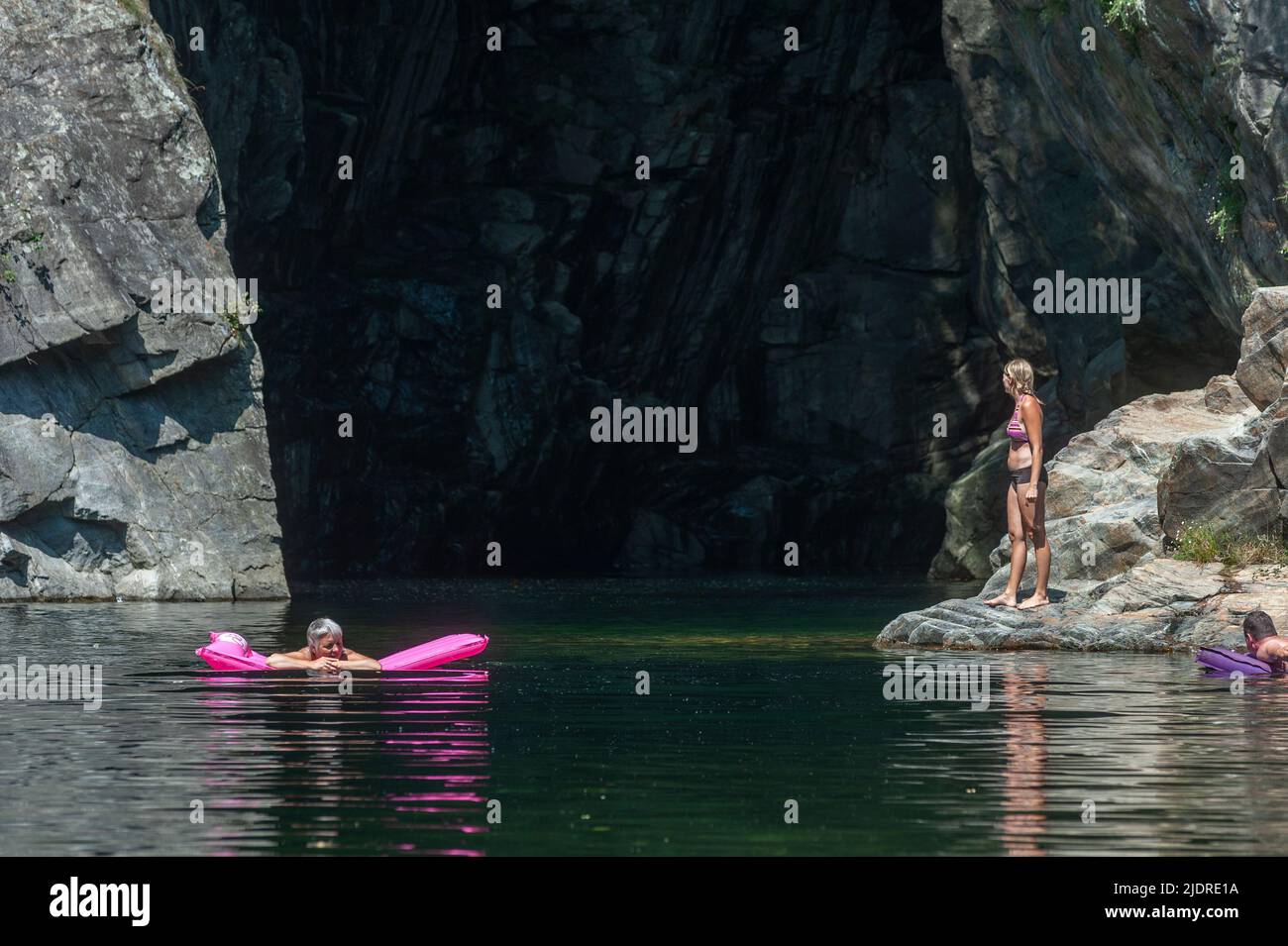 Bathing tourists in front of the Orrido di Sant Anna gorge on the Cannobino river in Valle Cannobina, Cannobio, Piedmont, Italy, Europe Stock Photo