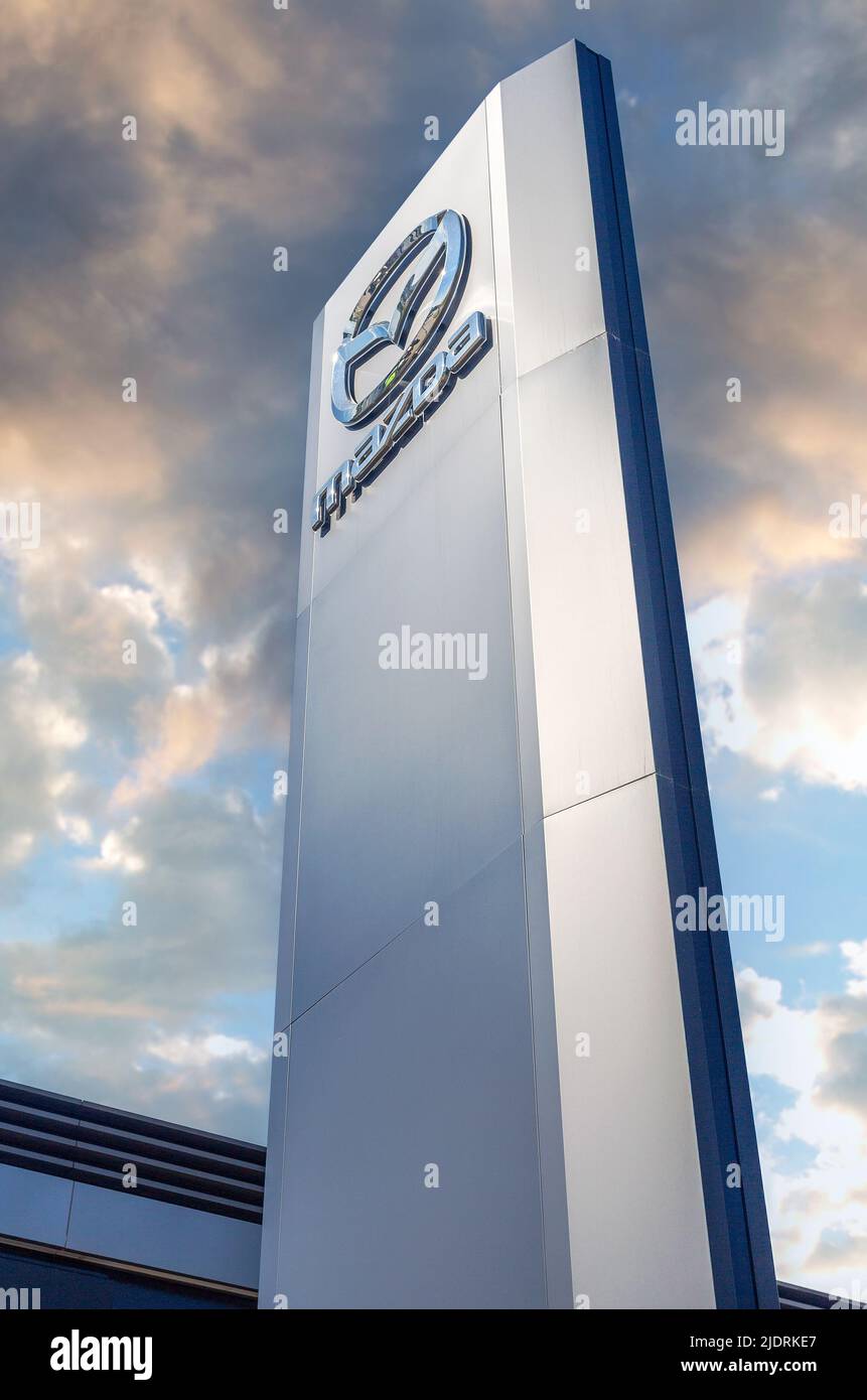 Samara, Russia - June 18, 2022: Dealership sign with the logo of Mazda Motor Corporation. Japanese vehicle automotive manufacturer Stock Photo