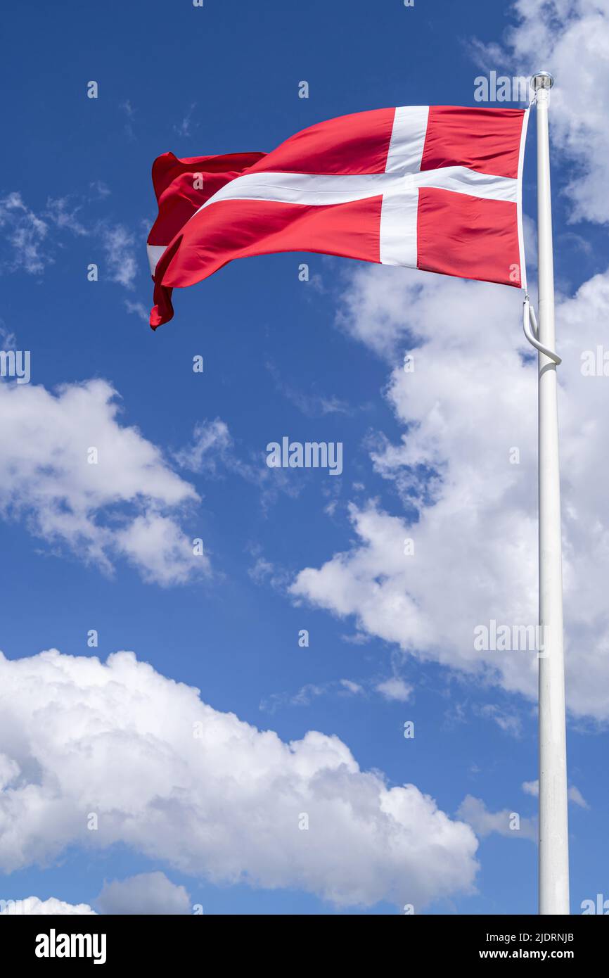 flag of Denmark flying in the wind Stock Photo