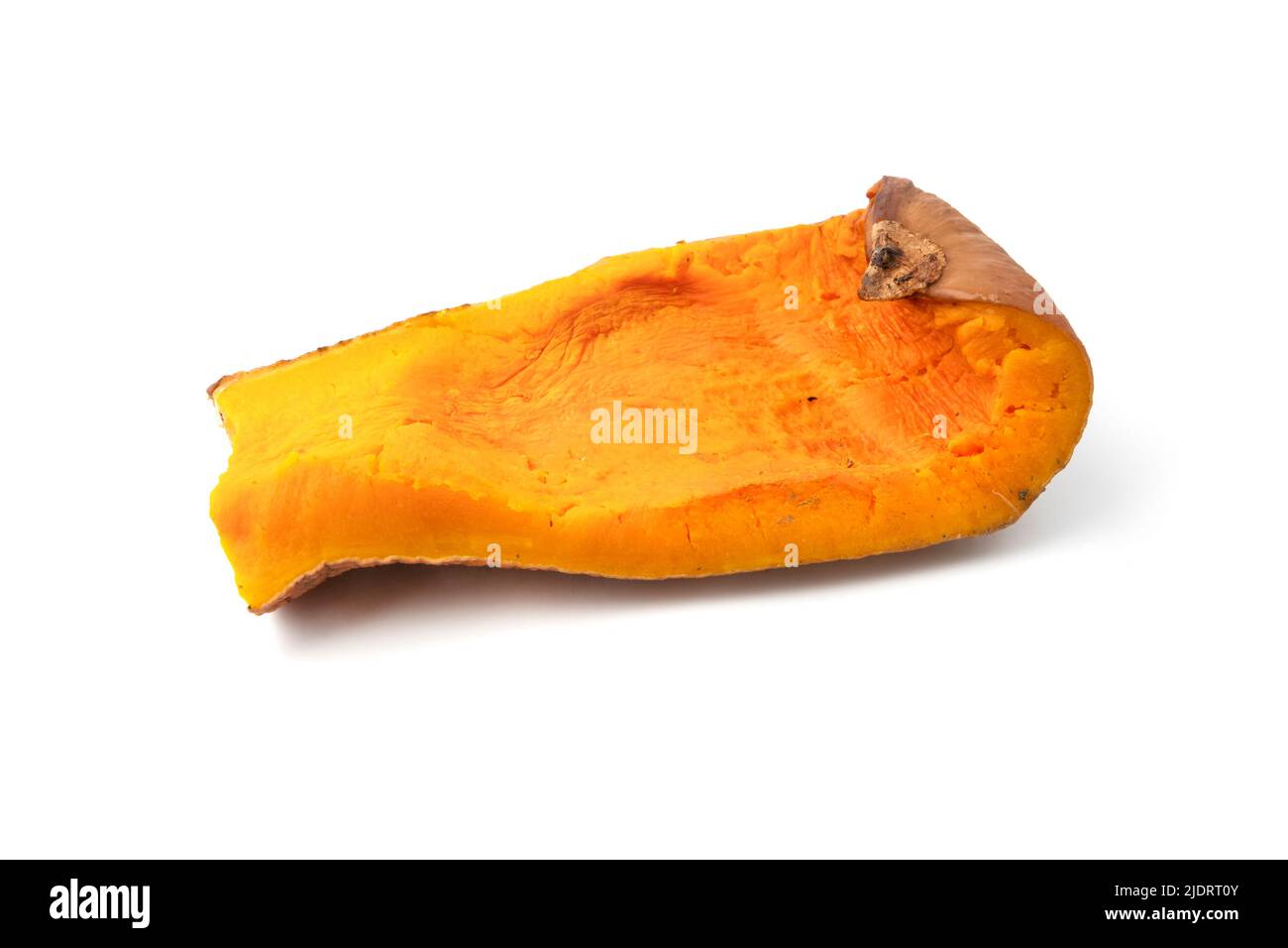 Slice of oven roasted pumpkin on a white background Stock Photo