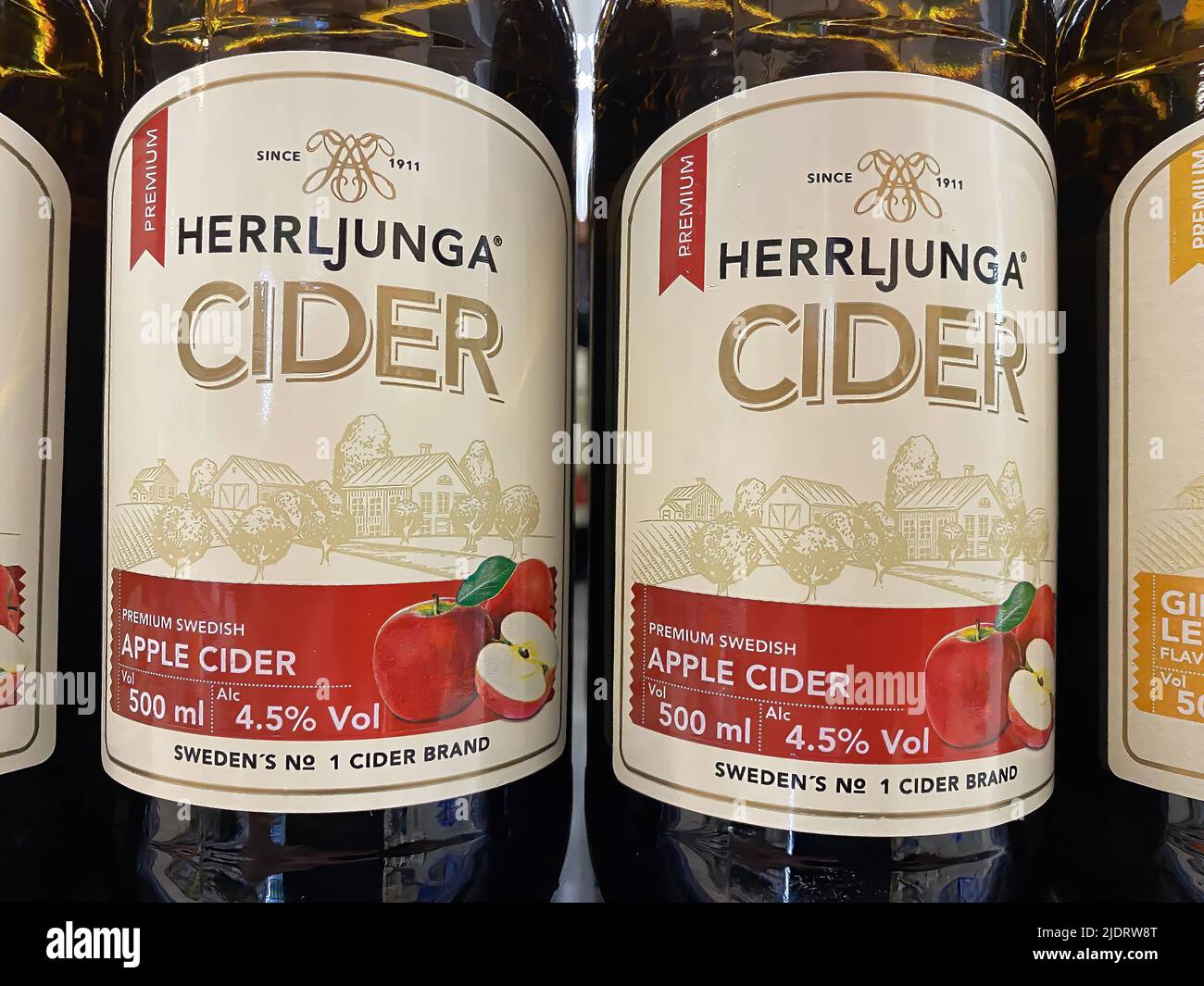 Erkelenz, Germany - Juin 9. 2022: Closeup of bottles Herrljunga swedish cider in shelf of german supermarket Stock Photo