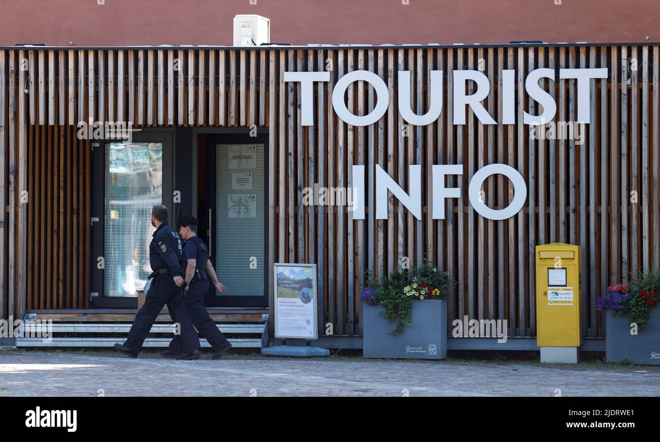 German police passes tourist information center in the southern Bavarian resort where the G7 Summit will be held, in Garmisch-Partenkirchen, Germany, June 23, 2022. REUTERS/Michaela Rehle Stock Photo