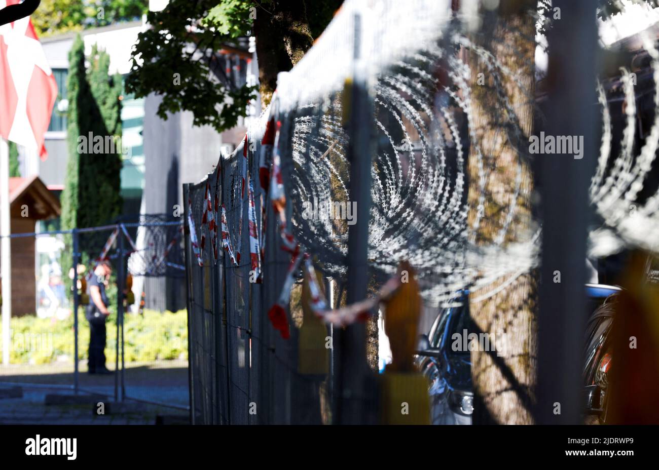 Barbed wire fence protect the police station placed in the Kongresszentrum of the southern Bavarian resort where the G7 Summit will be held, in Garmisch-Partenkirchen, Germany, June 23, 2022. REUTERS/Michaela Rehle Stock Photo