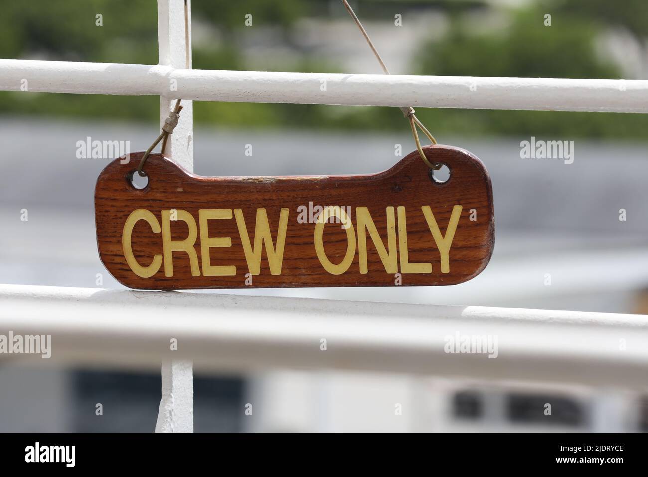 Hanged sign Crew Only on the stairs. Stock Photo