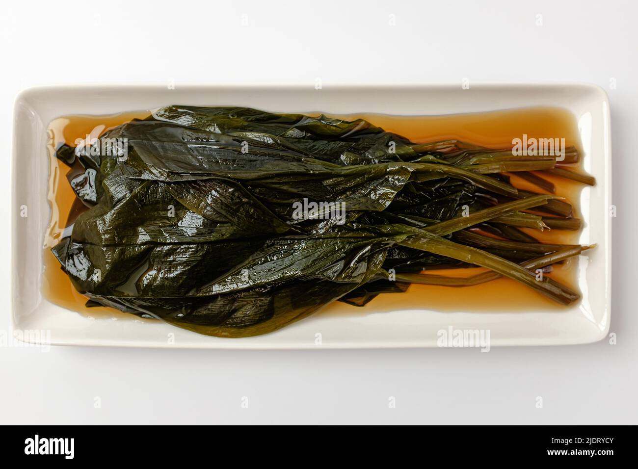 pickled food. food made from leaves. sweet and salty food Stock Photo