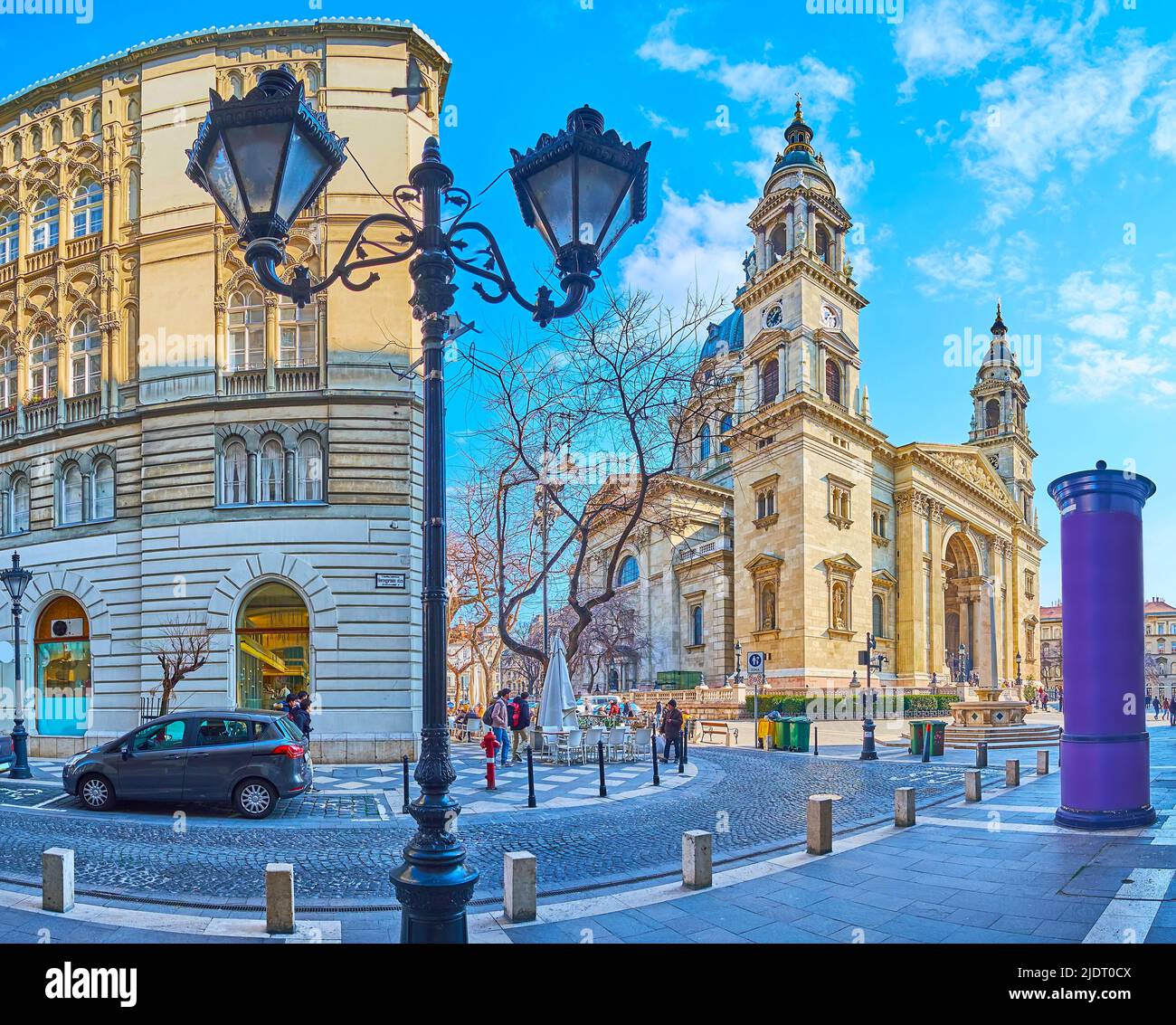 Panorama of historic Hercegprimas Street with a view on vintage streetlight and St Stephen's (Szent Istvan) Basilica, Budapest, Hungary Stock Photo