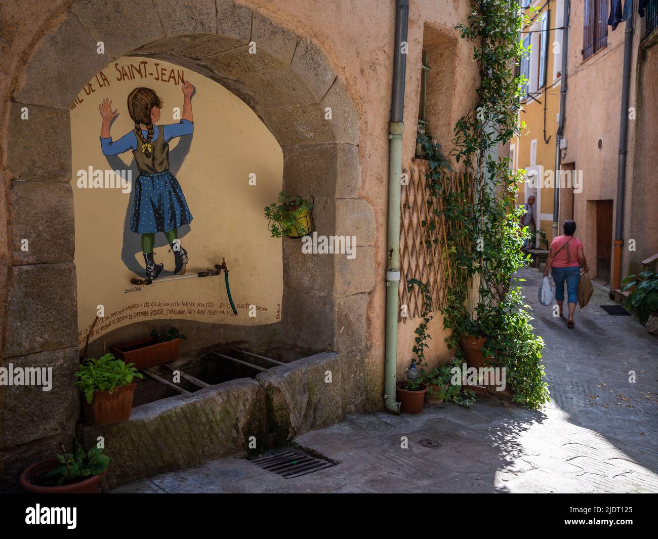 The village fountain for fresh water in the Alpine village of Villars-sur-Var in the Alpes-Martimes region of southeastern France. Stock Photo